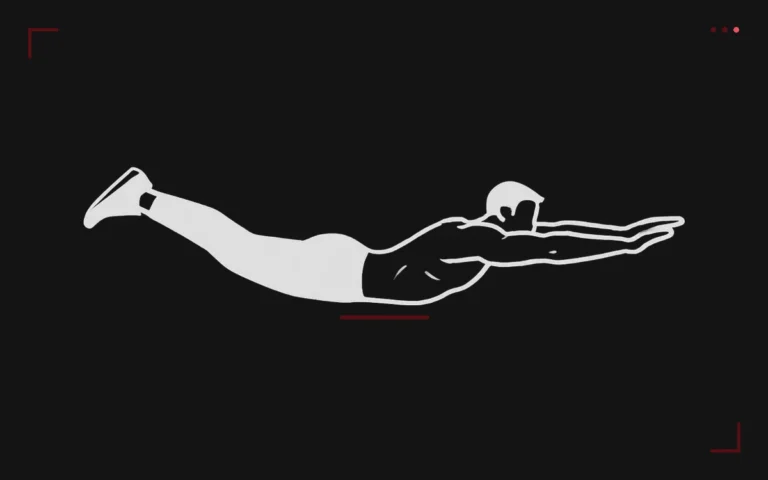 Superman hold: a man lying face down with arms and legs straight and lifted off the floor