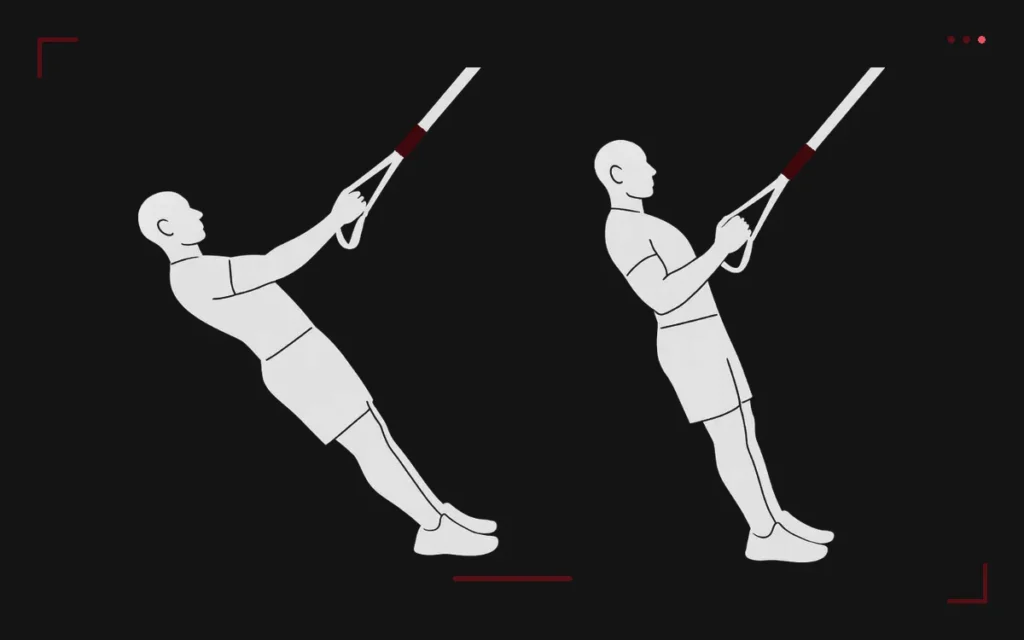 TRX row: a man leaning back holding the straps, then pulled up to the handles with a braced body